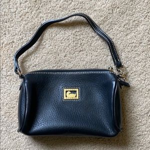 Small black leather Dooney and Bourke clutch